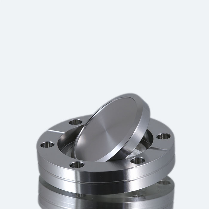 Tapped rotatable blank flange